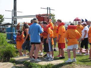 Racers about to enter the canoes